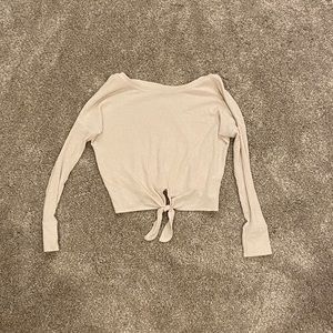 cream long sleeved tied shirt